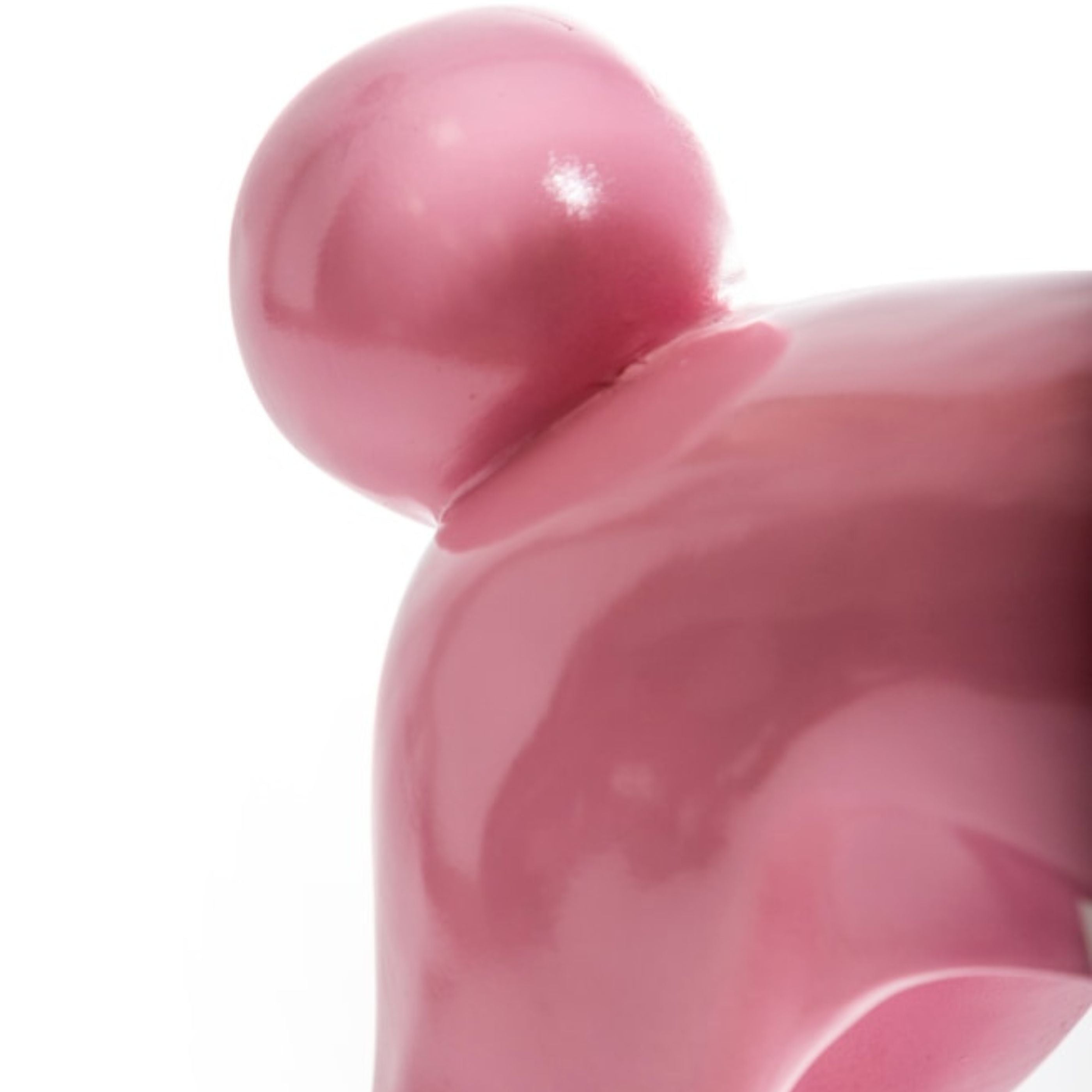 Close-up detail of the glossy pink resin poodle lamp showing the textured sculpted finish, on a white background