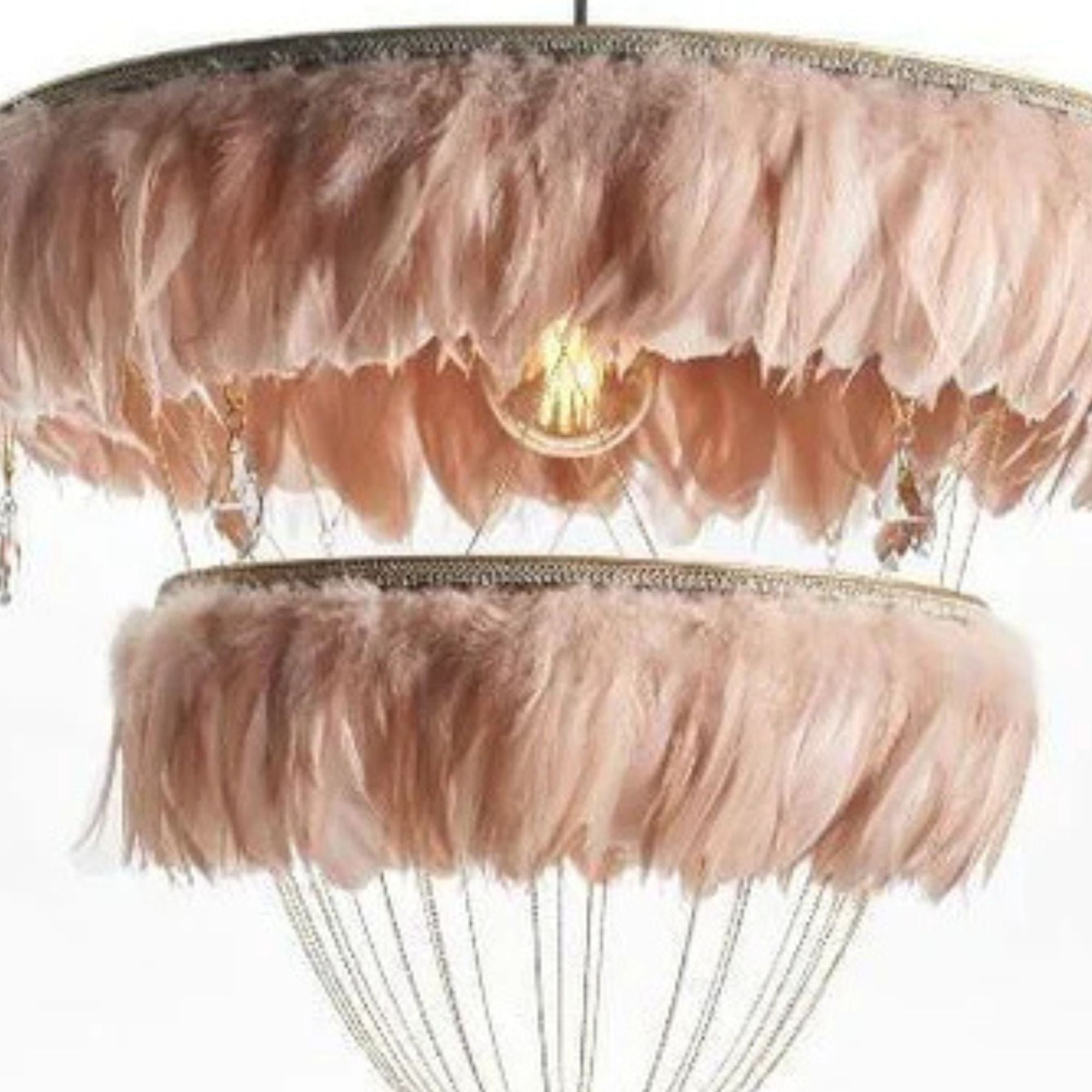 Close-up of the blush pink Bertie feather light shade with crystal drops, shown against a plain white background.