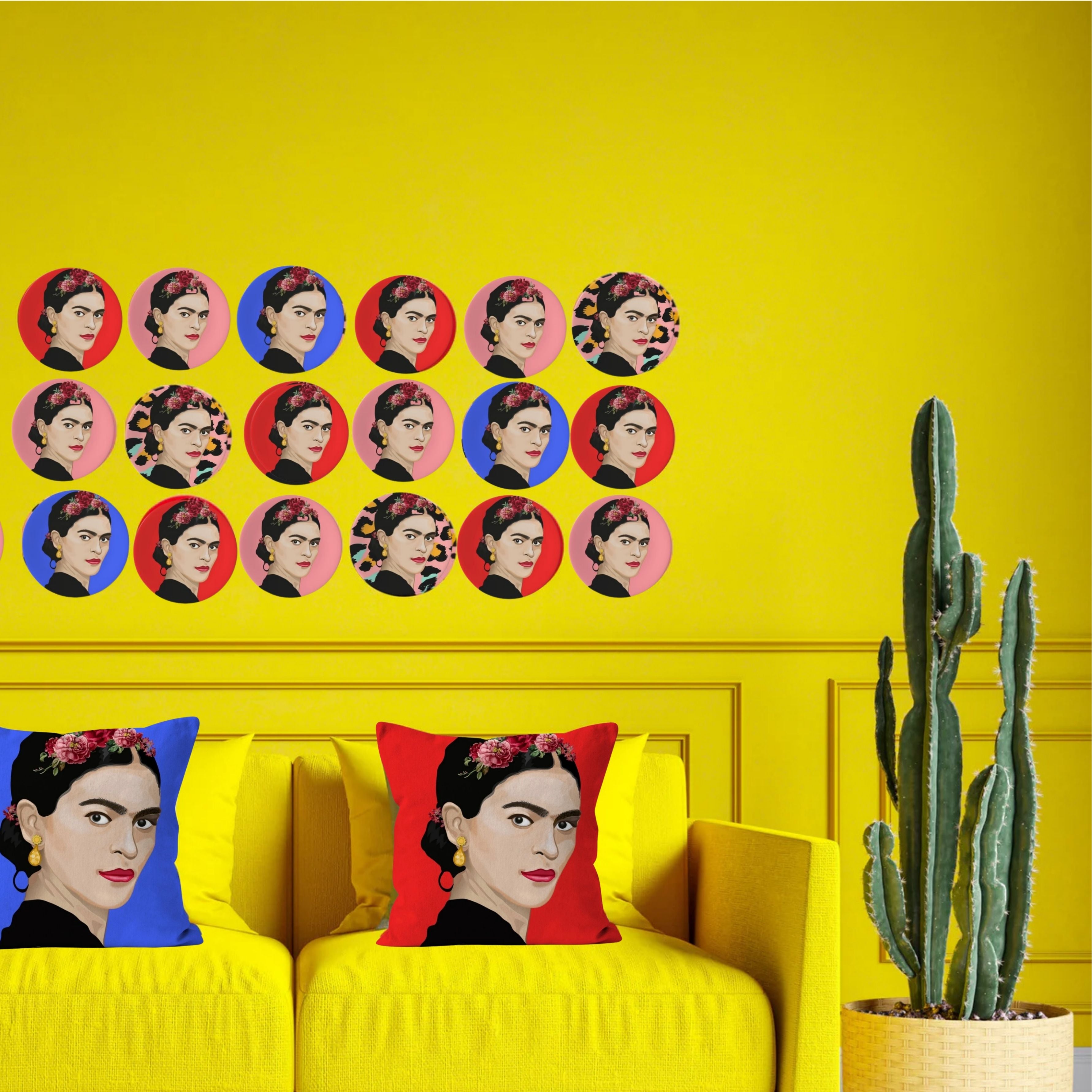Frida Kahlo inspired decorative plates displayed as a colourful gallery wall above a yellow sofa