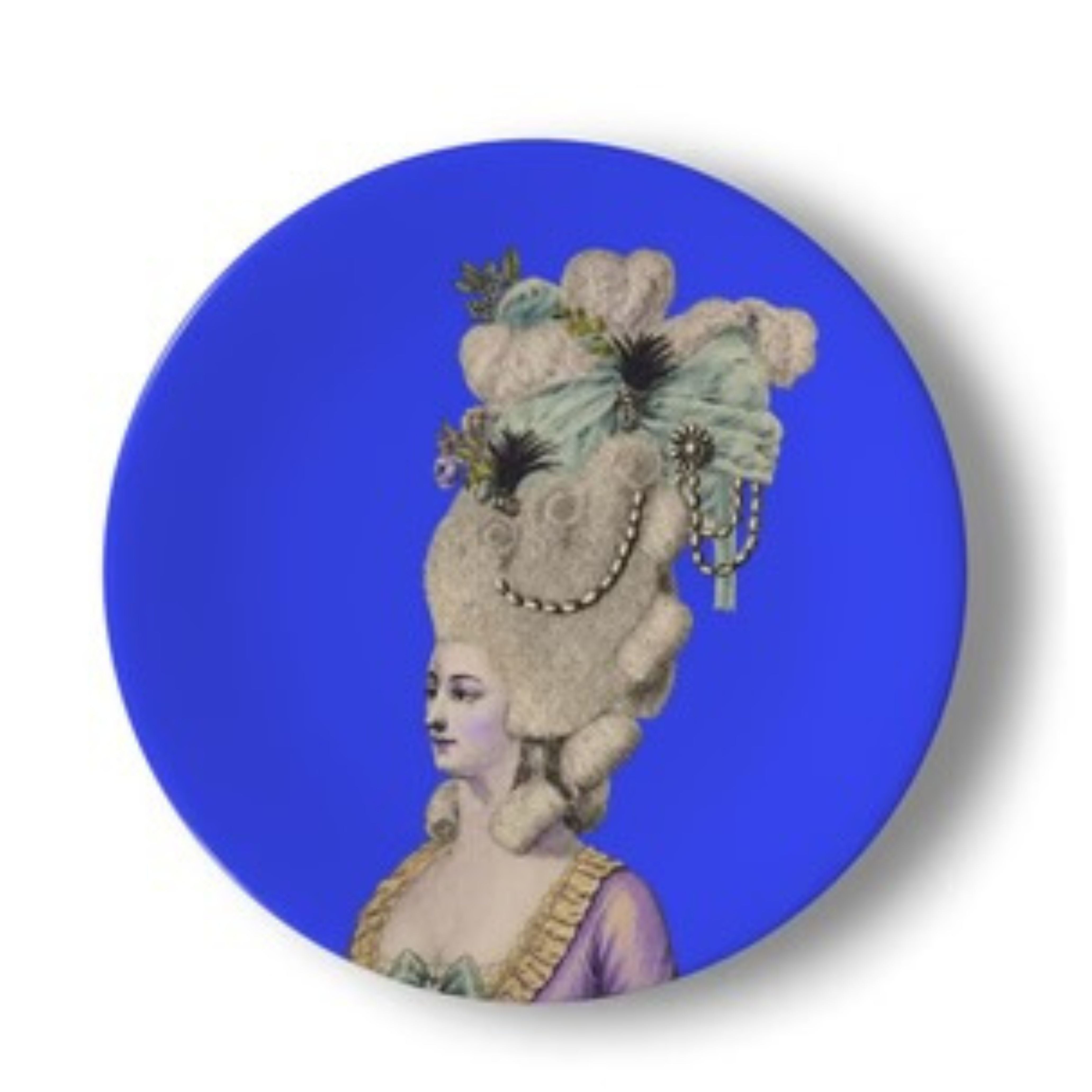 Lady Vivienne Montclair decorative ceramic plate featuring an elegant 18th century Rococo portrait with towering powdered hairstyle, pearl detailing and vivid cobalt blue background in bold maximalist style.