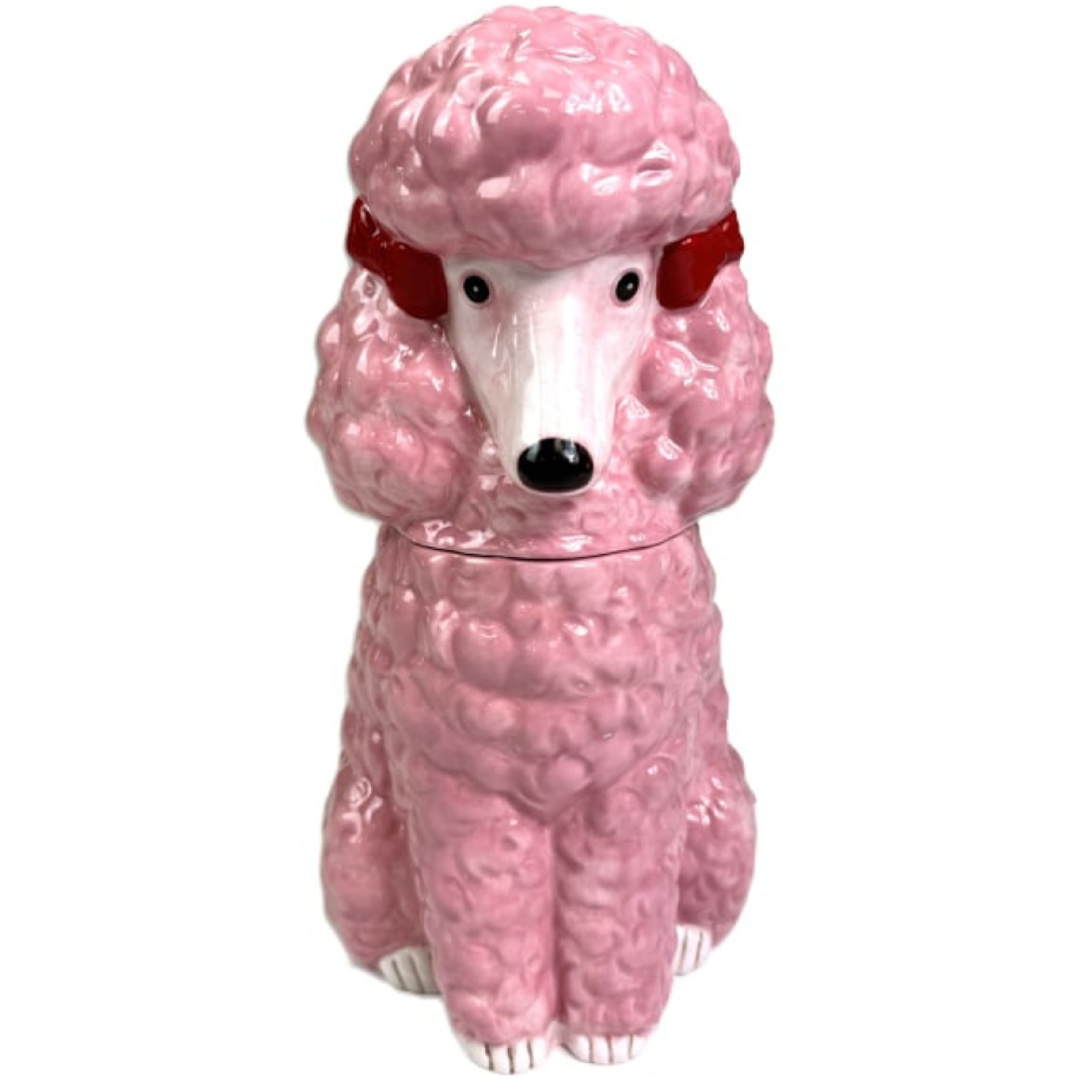 Pink ceramic poodle storage jar with removable lid on white background