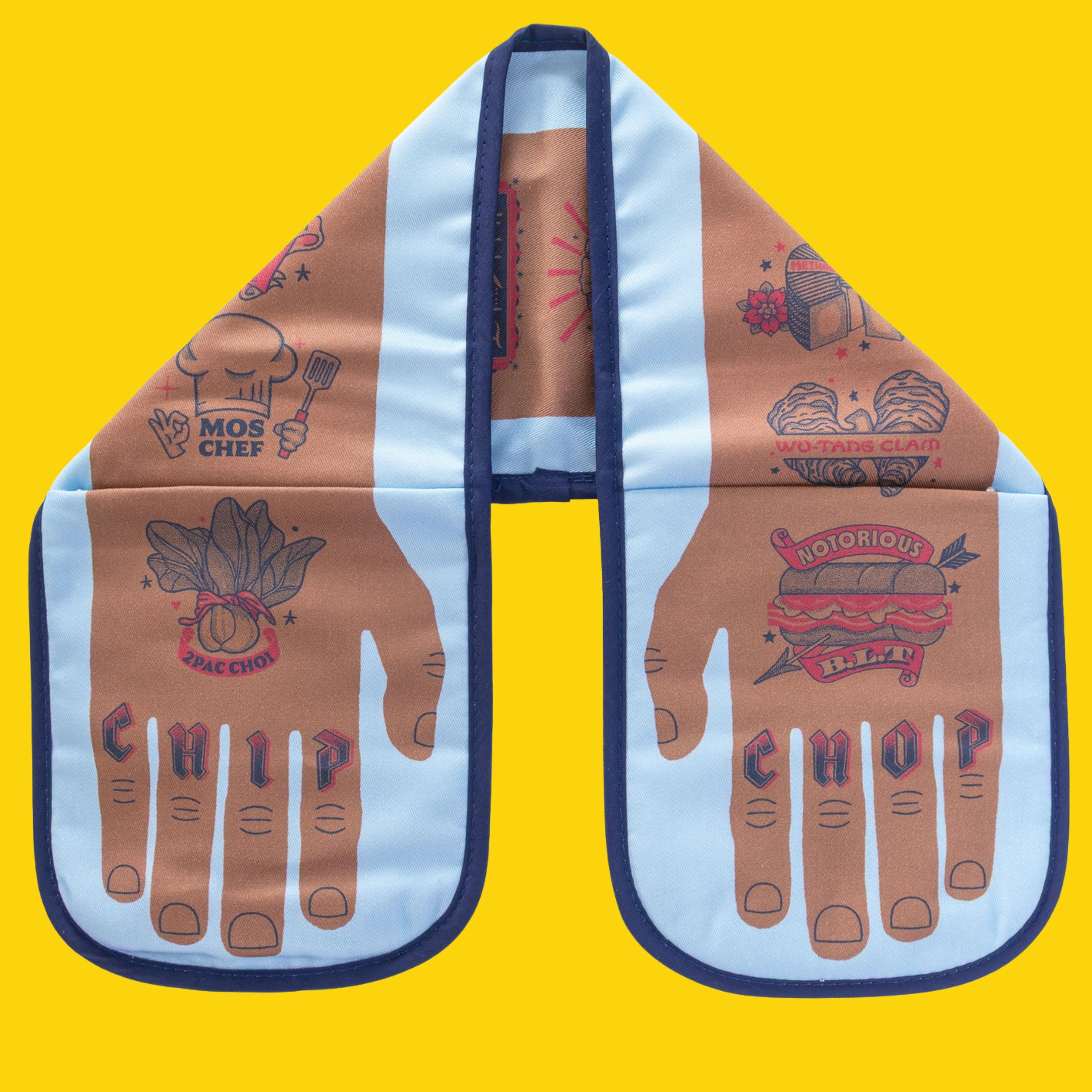 Chip Chop double oven glove with light blue panels and brown illustrated hip-hop food puns, including “CHIP” and “CHOP” on the fingertips, displayed flat on a bright yellow background.