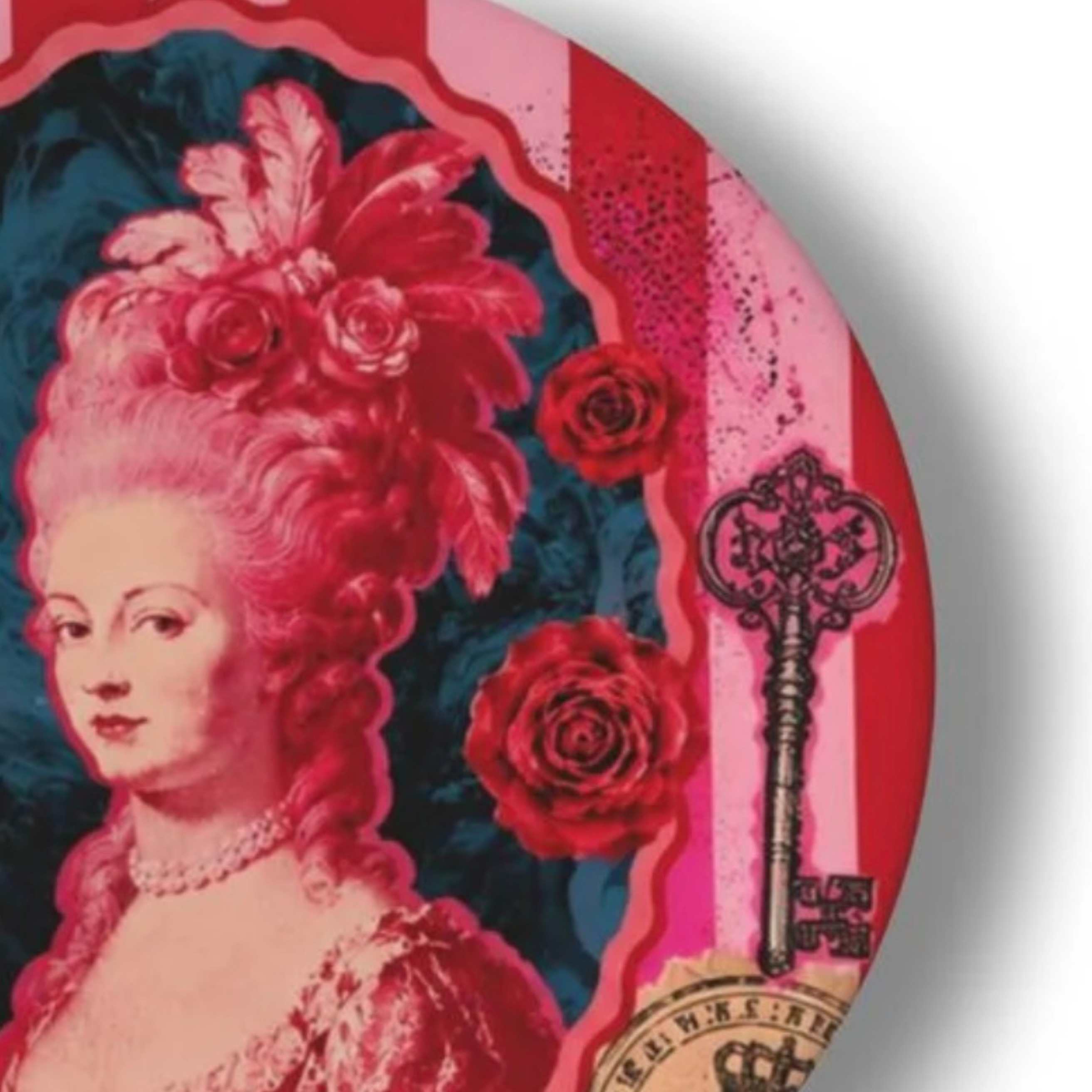 Close-up of Marie Antoinette pop art decorative ceramic plate with pink roses ornate key detail and vintage maximalist collage design
