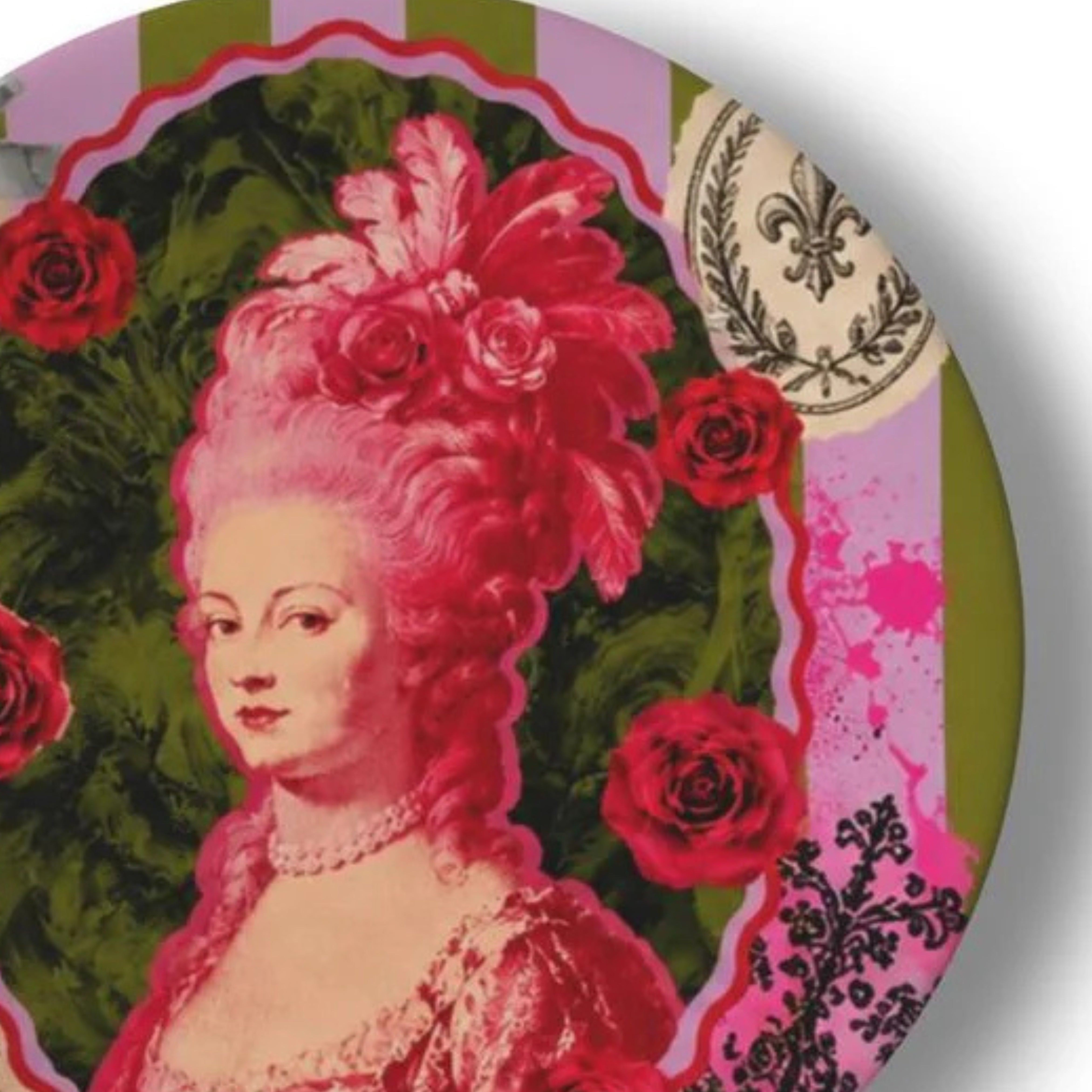 Close up of Marie Antoinette pop art decorative plate with pink portrait red roses vintage crest detail and green striped background