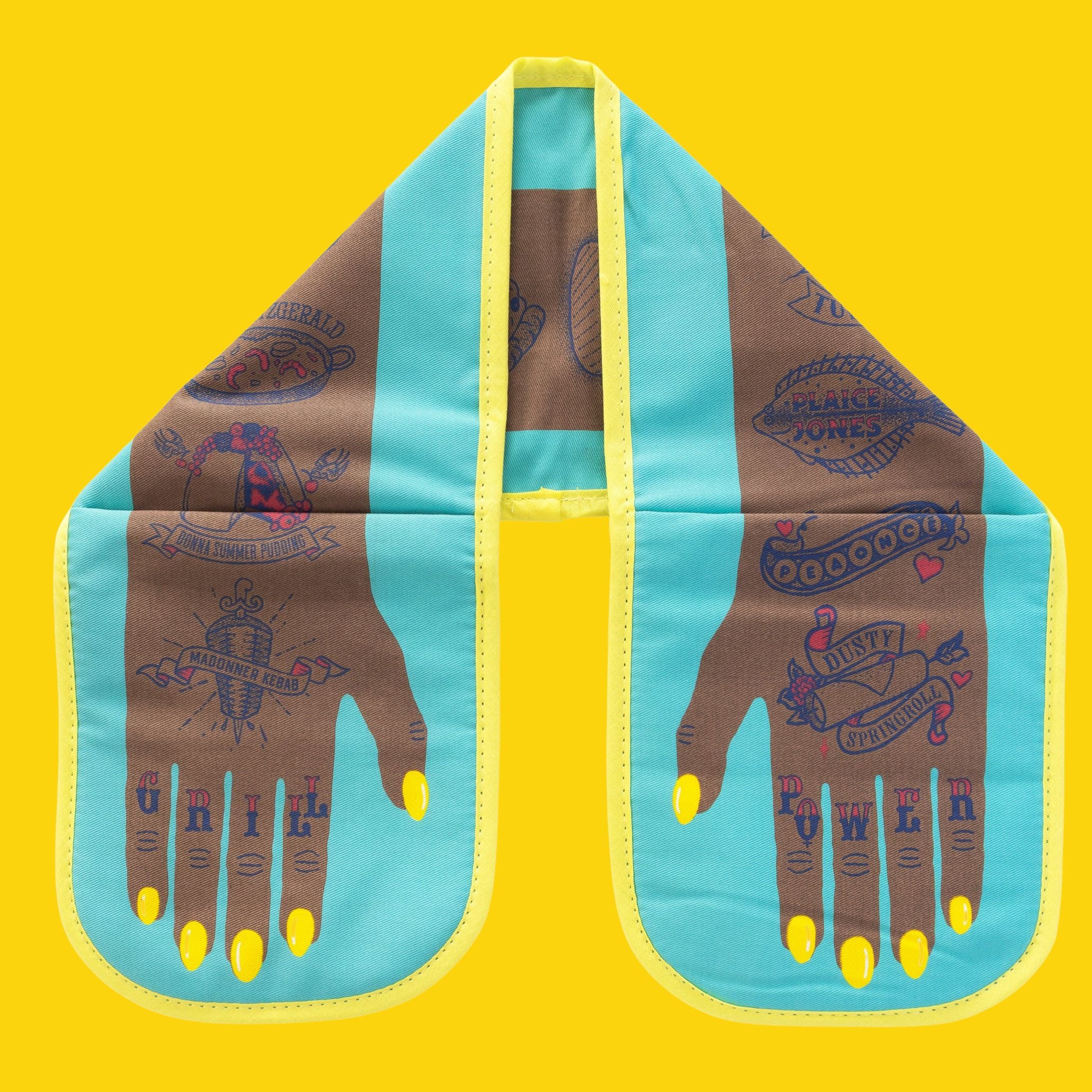 Double oven glove with illustrated tattoo-style hands and bright yellow nails, shown flat on a vibrant yellow background with turquoise panels and yellow edging.