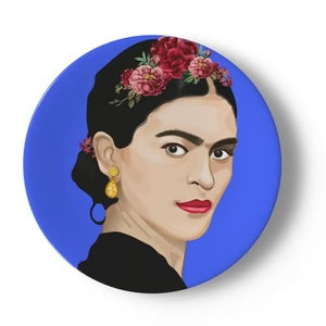 Frida Kahlo inspired illustration on a blue background, printed on a round ceramic decorative plate