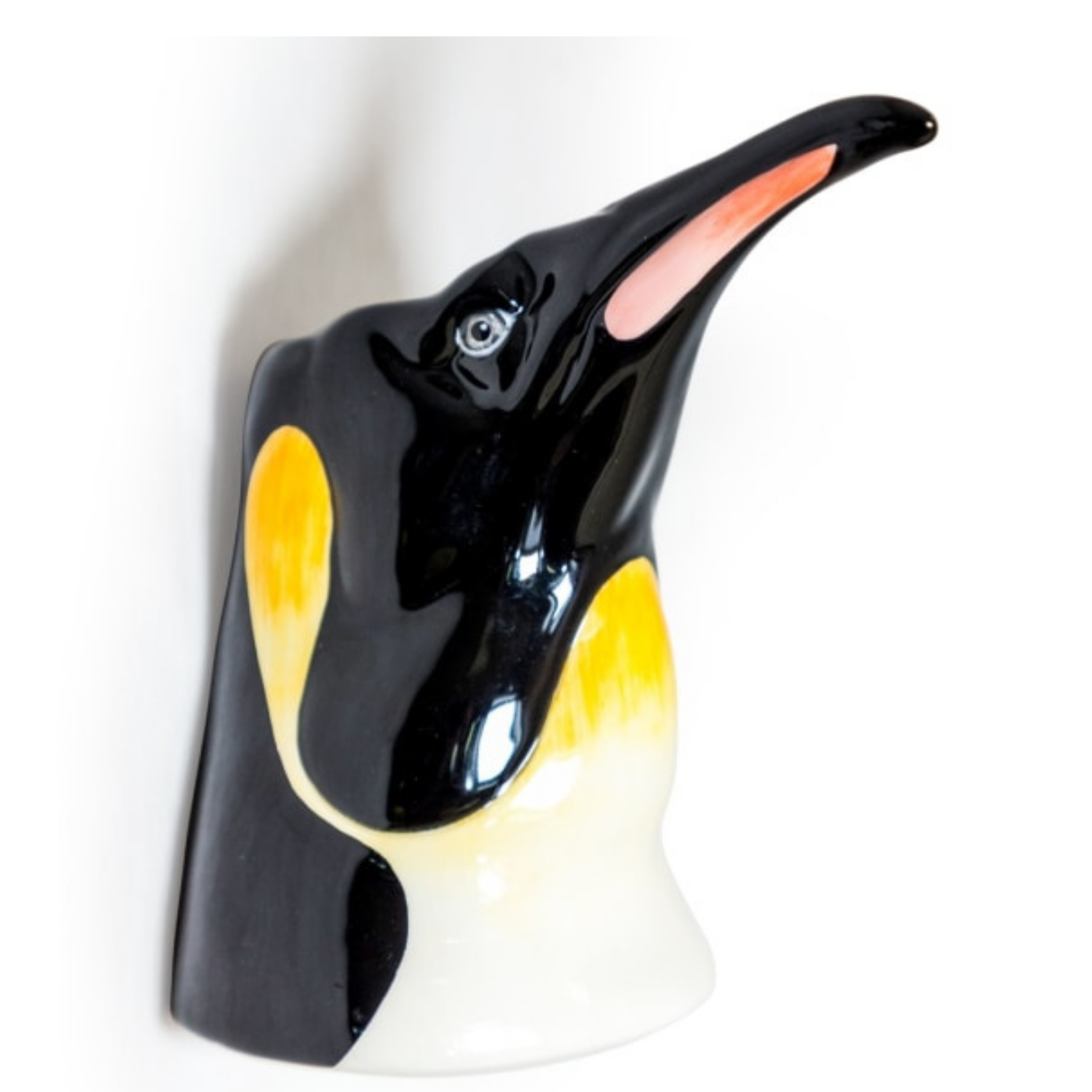 Side view of hand-painted ceramic penguin wall vase with glossy black, yellow, and white finish – shown against a white background.